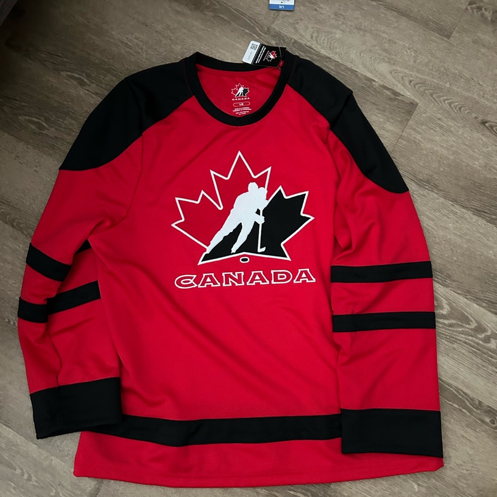 Team Canada Authentic Hockey Red and Black Jersey New. Xtra Large